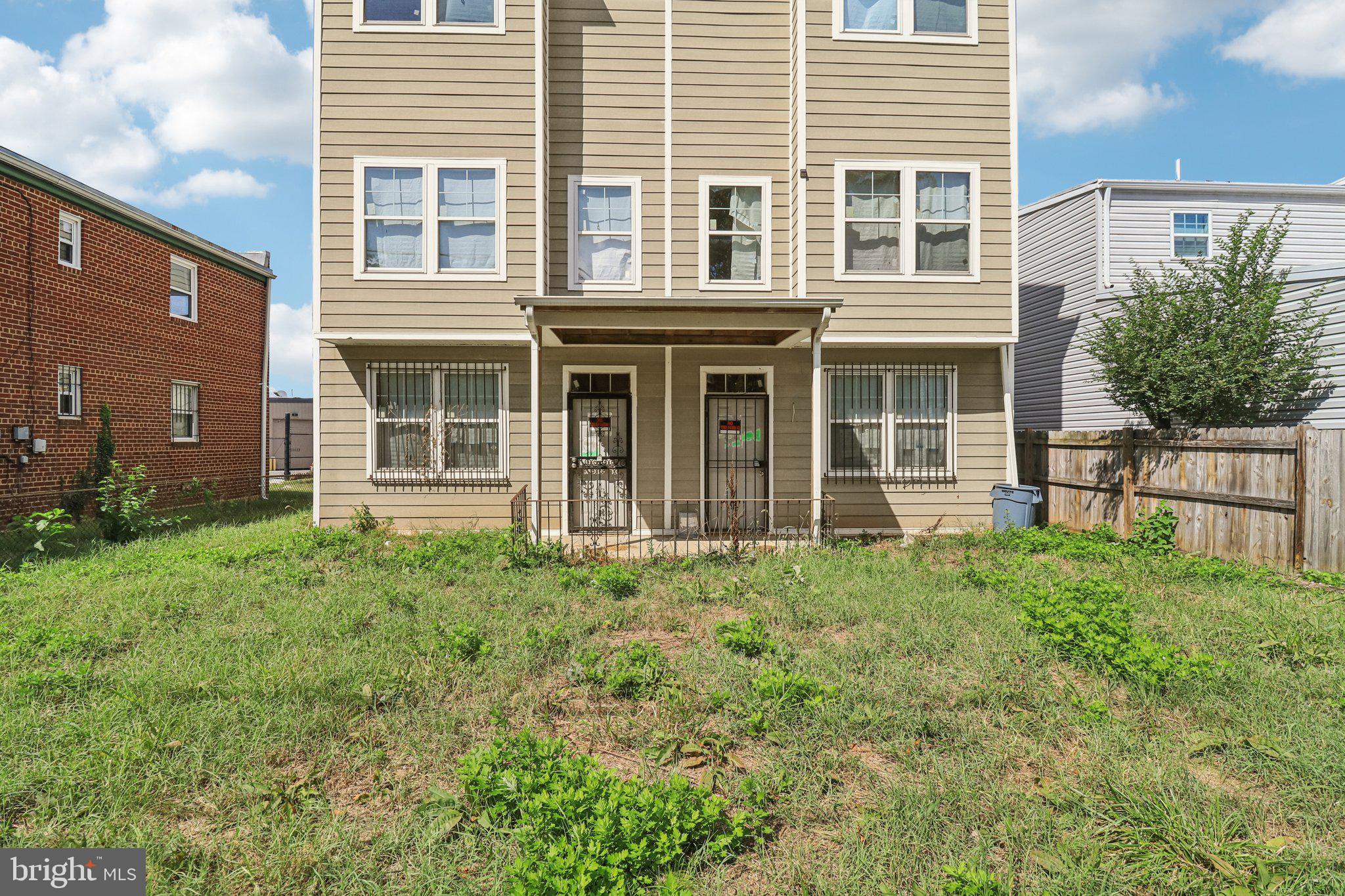 1058 44th Street Northeast Washington, DC 20019 - Photo 3 of 6 a house view with a garden space