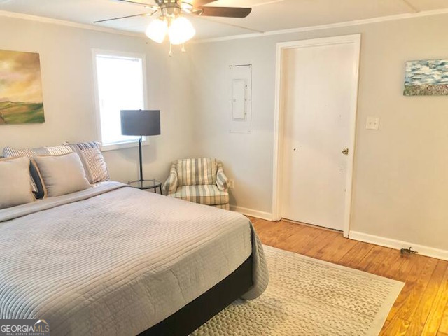 12754 State Route 96 Fort Valley, GA 31030 - Photo 11 of 26 a bedroom with a bed and a lamp