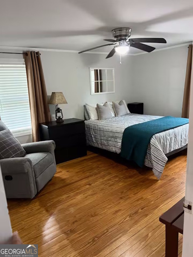 12754 State Route 96 Fort Valley, GA 31030 - Photo 12 of 26 a bedroom with a bed and a couch