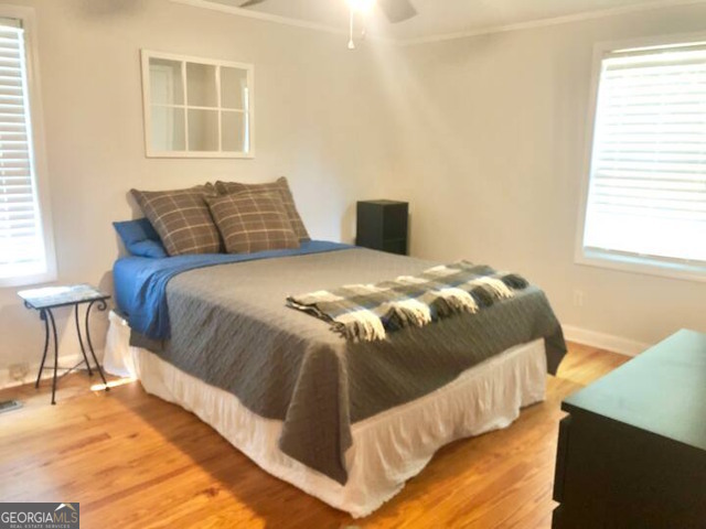 12754 State Route 96 Fort Valley, GA 31030 - Photo 14 of 26 a bedroom with a bed and a window