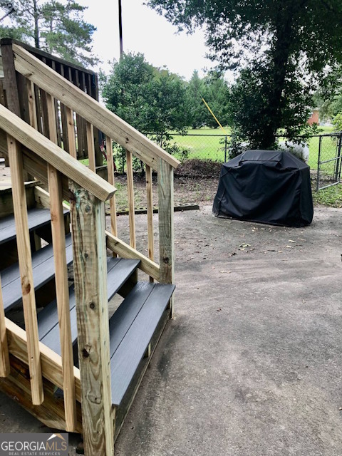 12754 State Route 96 Fort Valley, GA 31030 - Photo 19 of 26 a balcony with tall trees