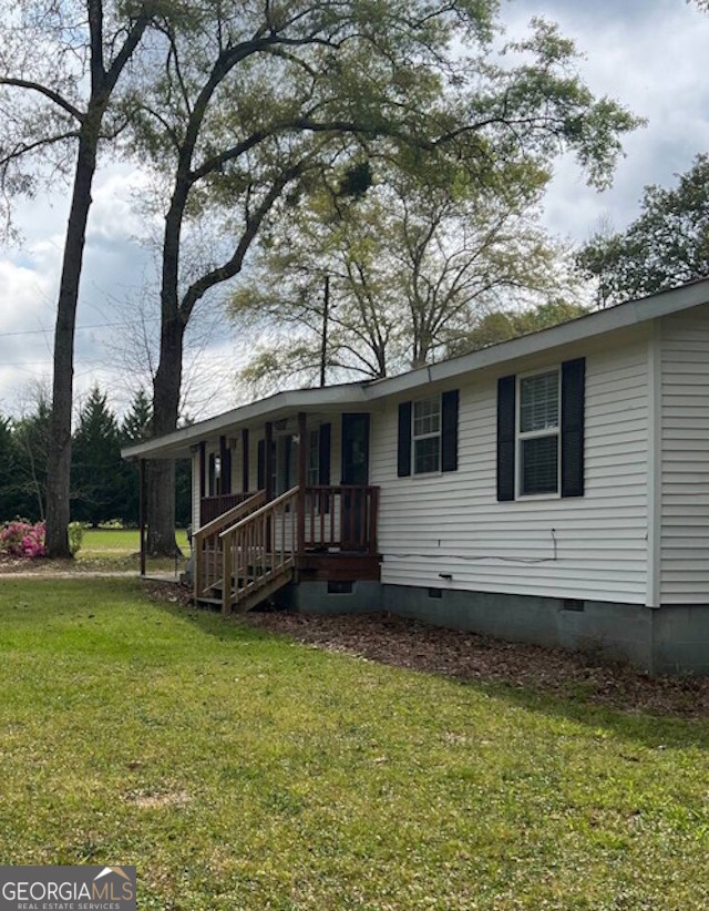 12754 State Route 96 Fort Valley, GA 31030 - Photo 20 of 26 a view of a house with a yard