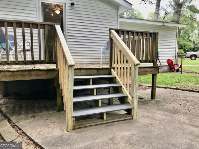 12754 State Route 96 Fort Valley, GA 31030 - Photo 21 of 26 a view of entryway with wooden floor and a front door