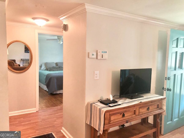 12754 State Route 96 Fort Valley, GA 31030 - Photo 5 of 26 a bedroom with a bed and a flat screen tv