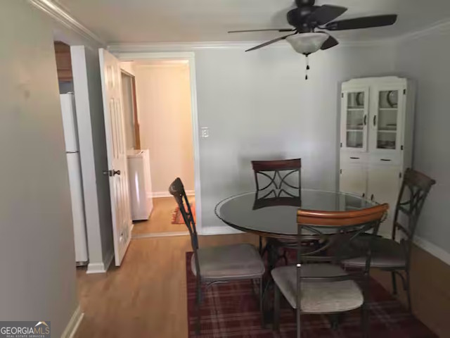 12754 State Route 96 Fort Valley, GA 31030 - Photo 9 of 26 a view of a room with a table and chairs