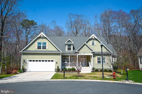 a view of a house with a mountain in the background