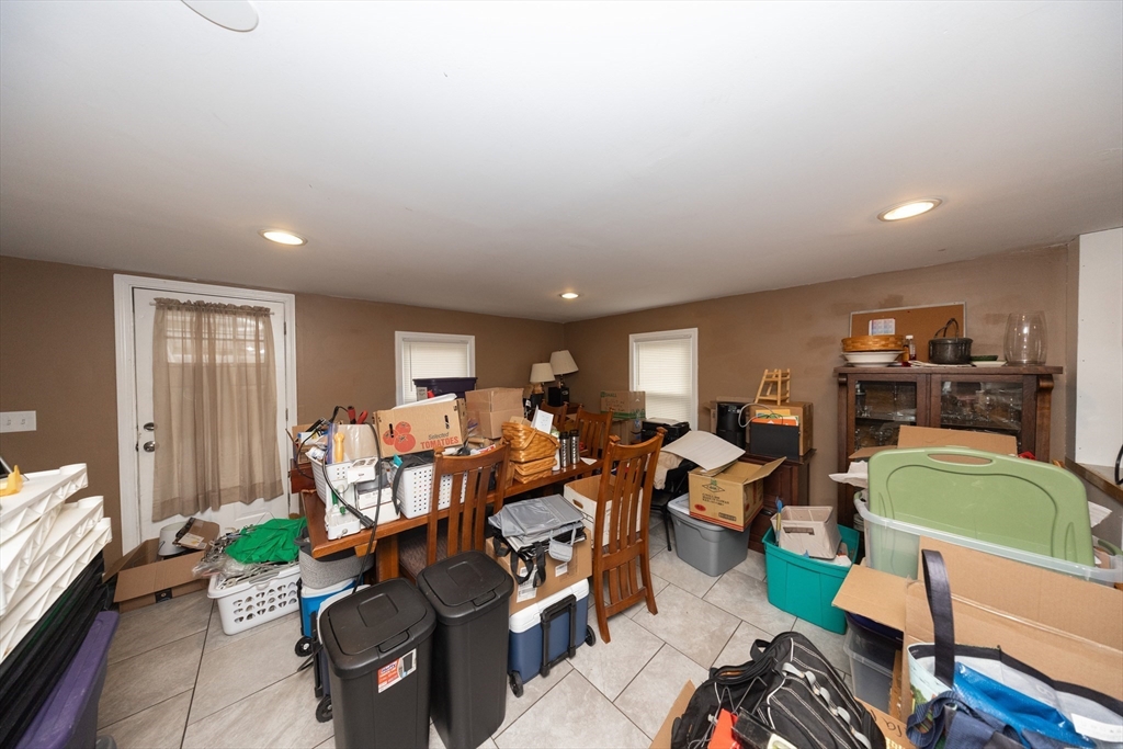 151 Mechanic Street Fitchburg, MA 01420 - Photo 16 of 42 a living room with furniture kitchen view and a window