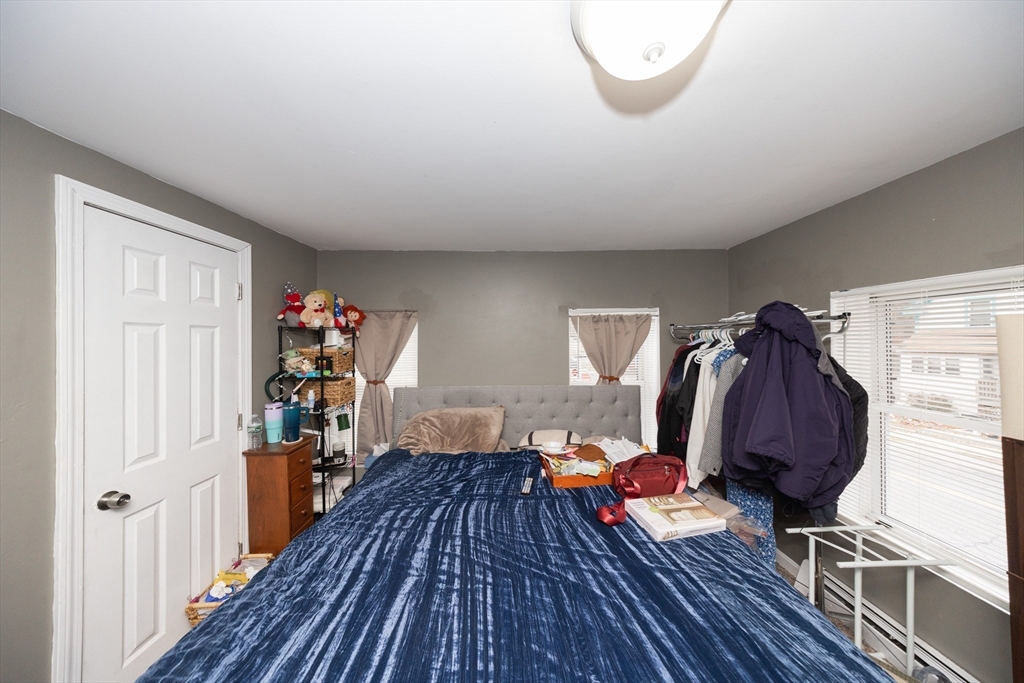 151 Mechanic Street Fitchburg, MA 01420 - Photo 19 of 42 a view of livingroom with furniture and wooden floor