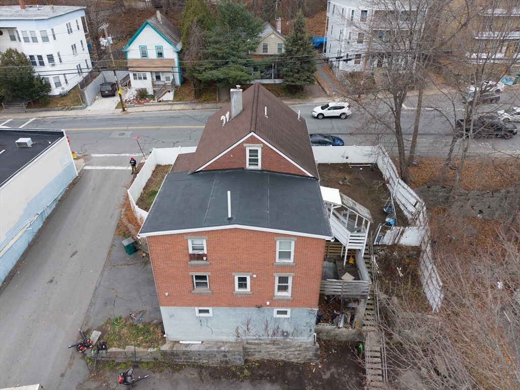 151 Mechanic Street Fitchburg, MA 01420 - Photo 2 of 42 an aerial view of a house with a yard