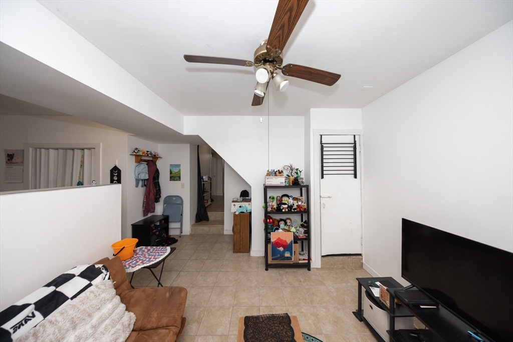 151 Mechanic Street Fitchburg, MA 01420 - Photo 36 of 42 a room with furniture and gym equipment