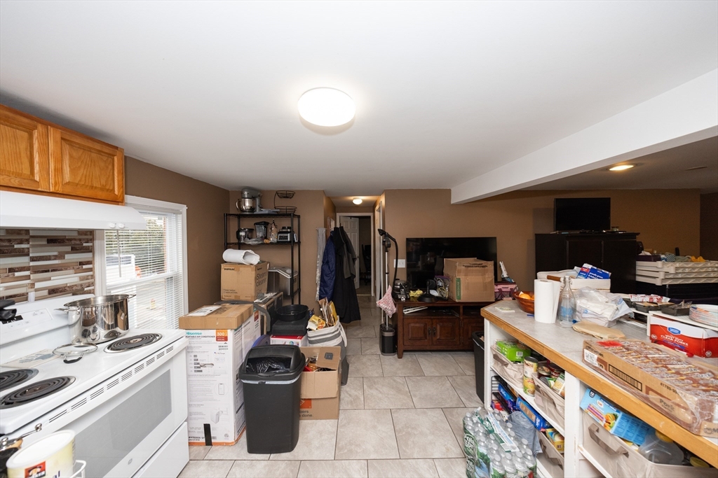 151 Mechanic Street Fitchburg, MA 01420 - Photo 8 of 42 a kitchen with a sink and a stove top oven