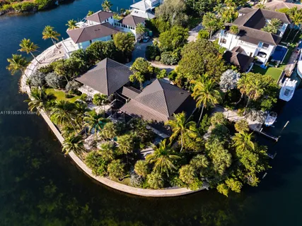 view of a lake with lawn chairs