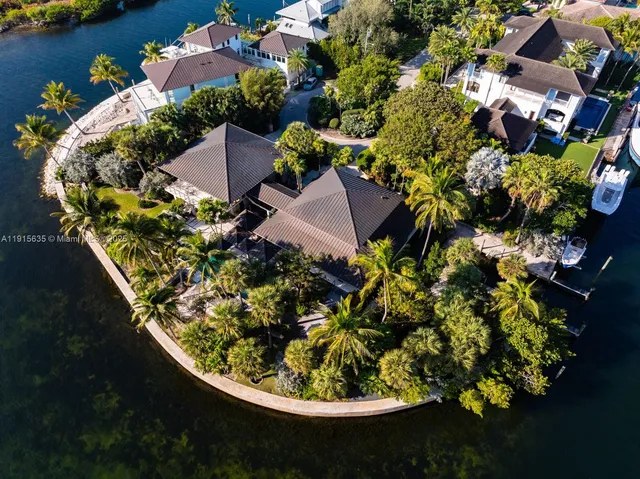 view of a lake with lawn chairs