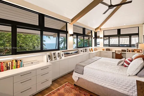 a view of swimming pool with a table and chairs