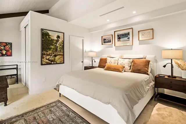 a view of a yard with palm trees