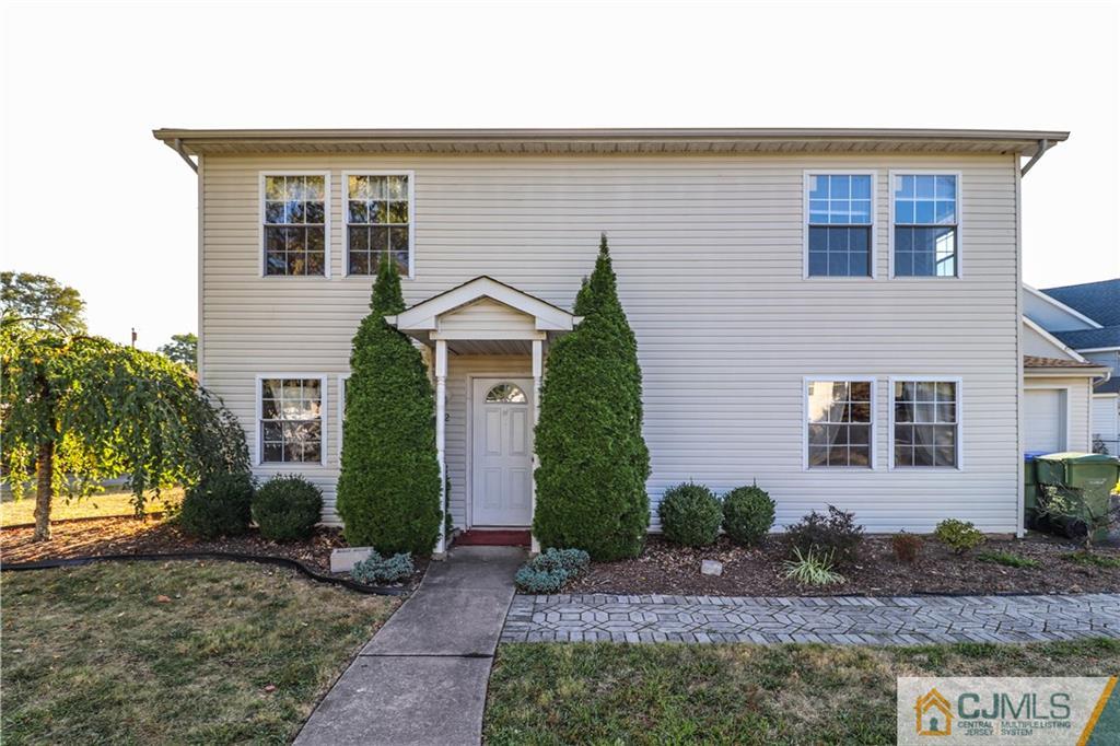 2 Altamont Road Edison, NJ 08817 - Photo 1 of 40 a front view of a house with garden