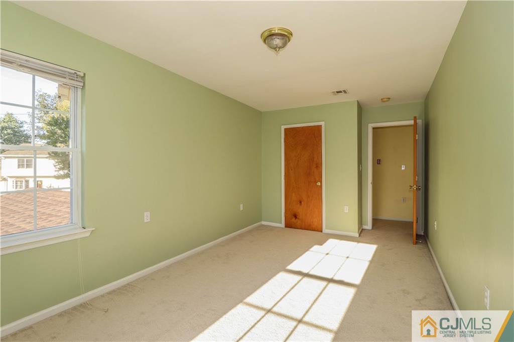 2 Altamont Road Edison, NJ 08817 - Photo 11 of 40 a view of an empty room and window