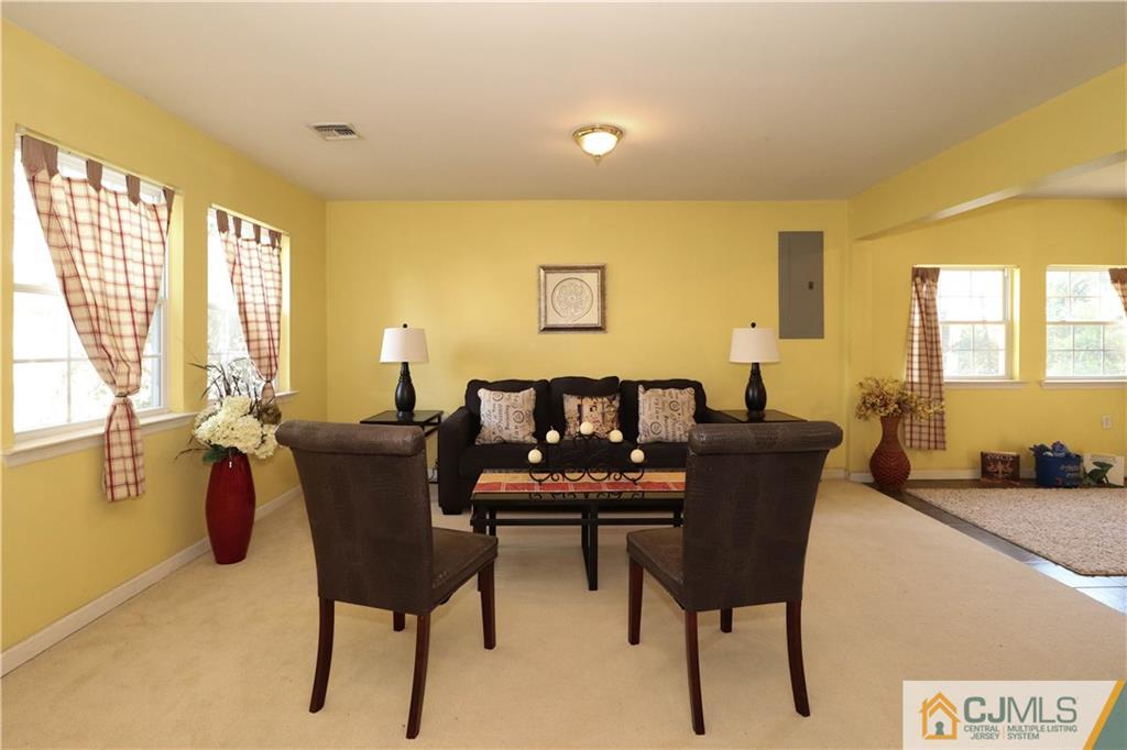 2 Altamont Road Edison, NJ 08817 - Photo 18 of 40 a view of a dining room with furniture and a window