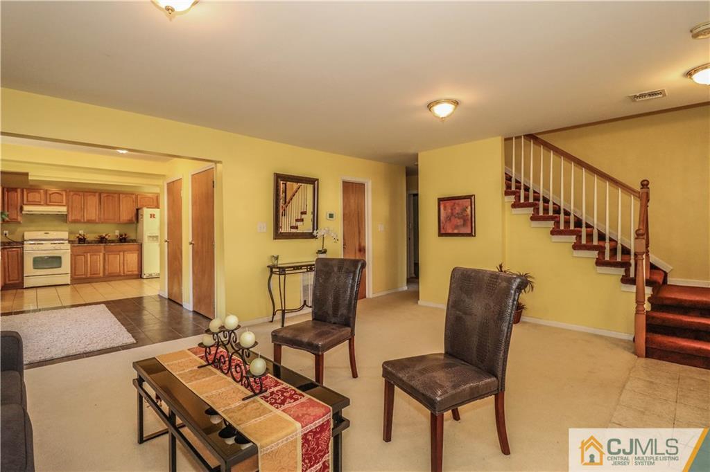 2 Altamont Road Edison, NJ 08817 - Photo 19 of 40 a living room with furniture and wooden floor