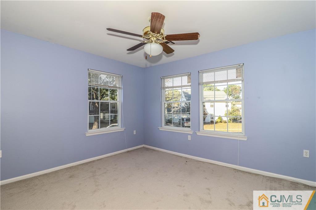 2 Altamont Road Edison, NJ 08817 - Photo 25 of 40 an empty room with windows and fan