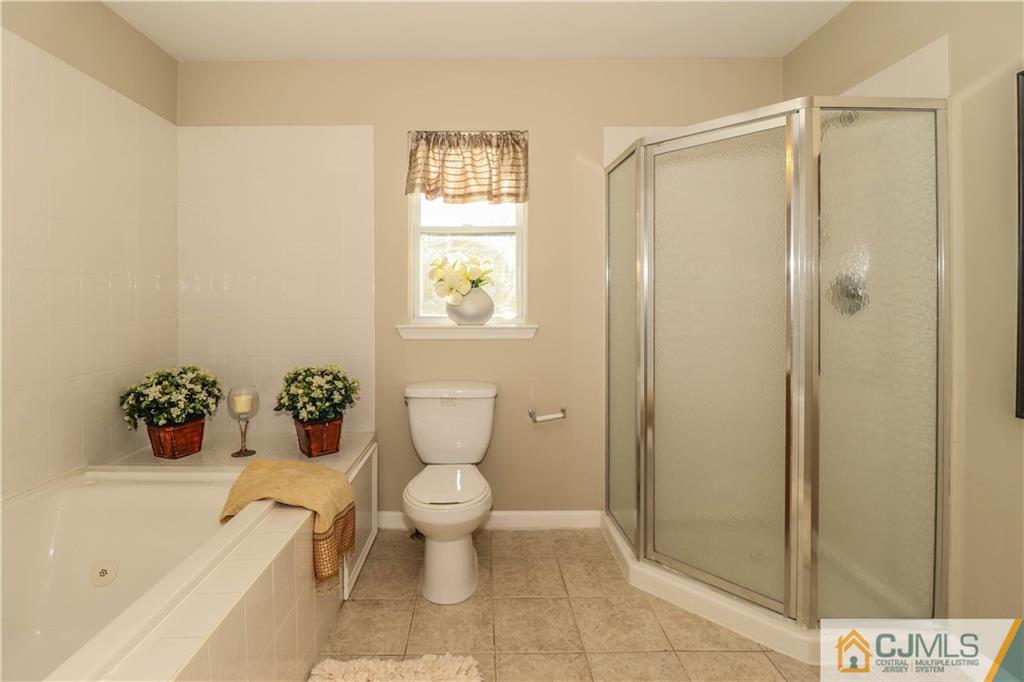 2 Altamont Road Edison, NJ 08817 - Photo 29 of 40 a bathroom with a toilet sink and shower