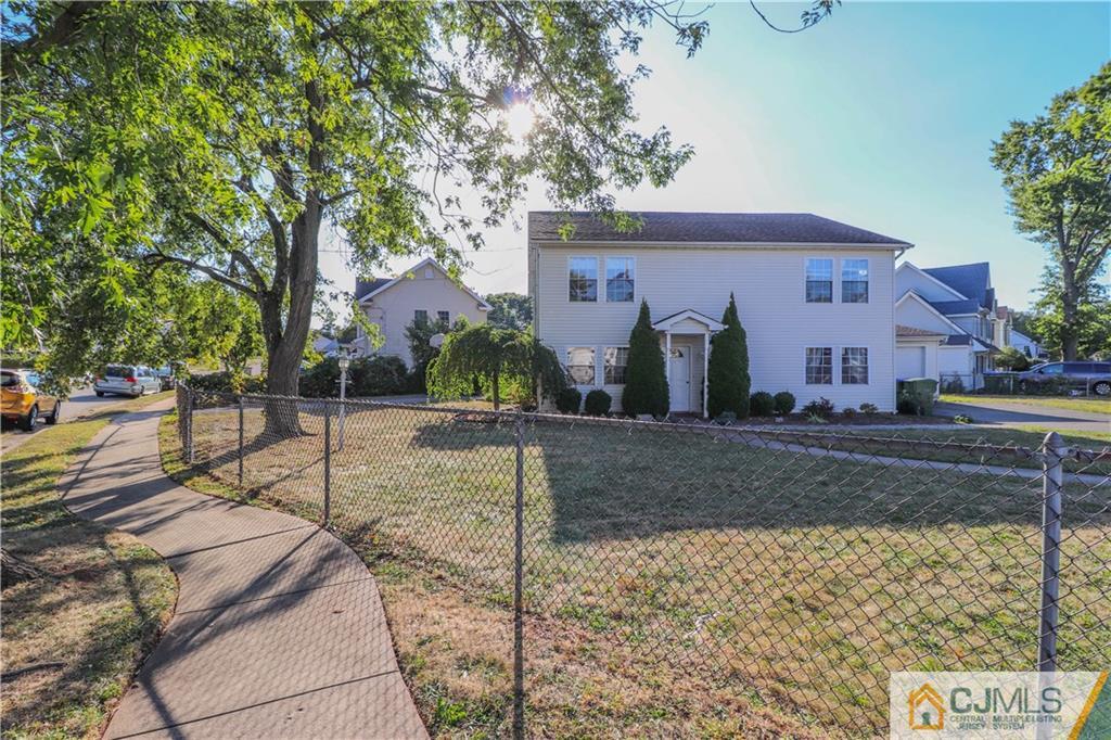 2 Altamont Road Edison, NJ 08817 - Photo 33 of 40 a front view of a house with garden