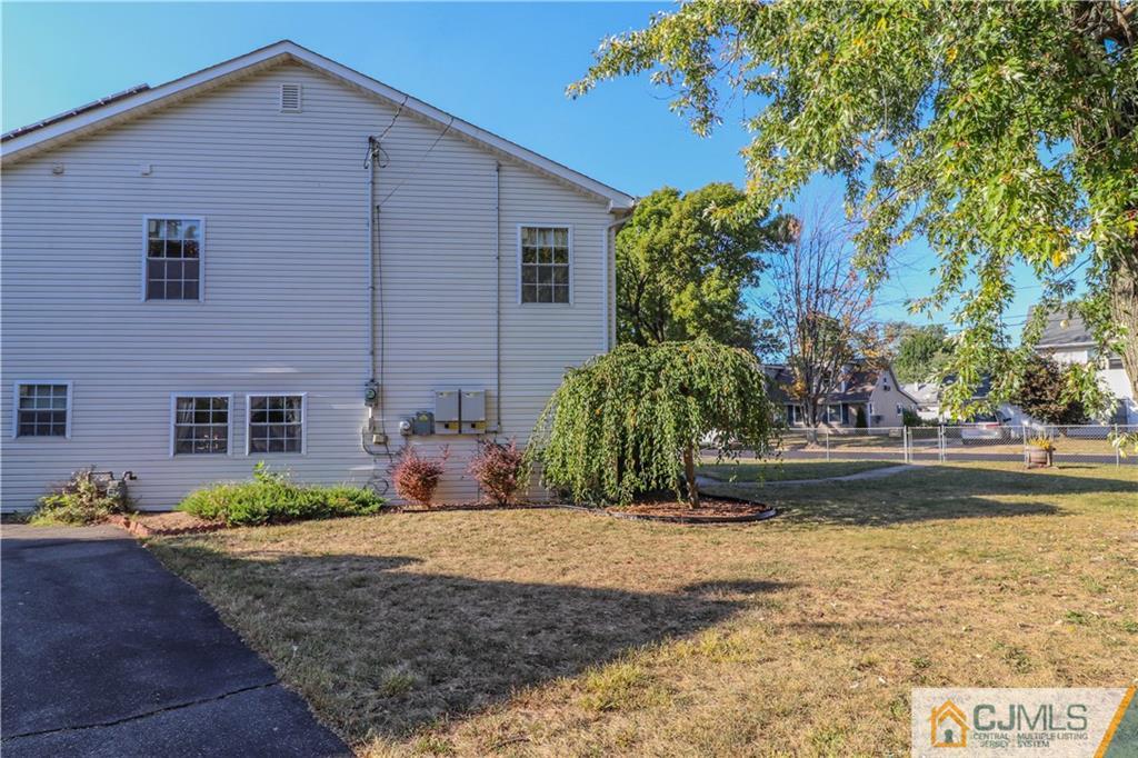 2 Altamont Road Edison, NJ 08817 - Photo 36 of 40 a front view of a house with garden