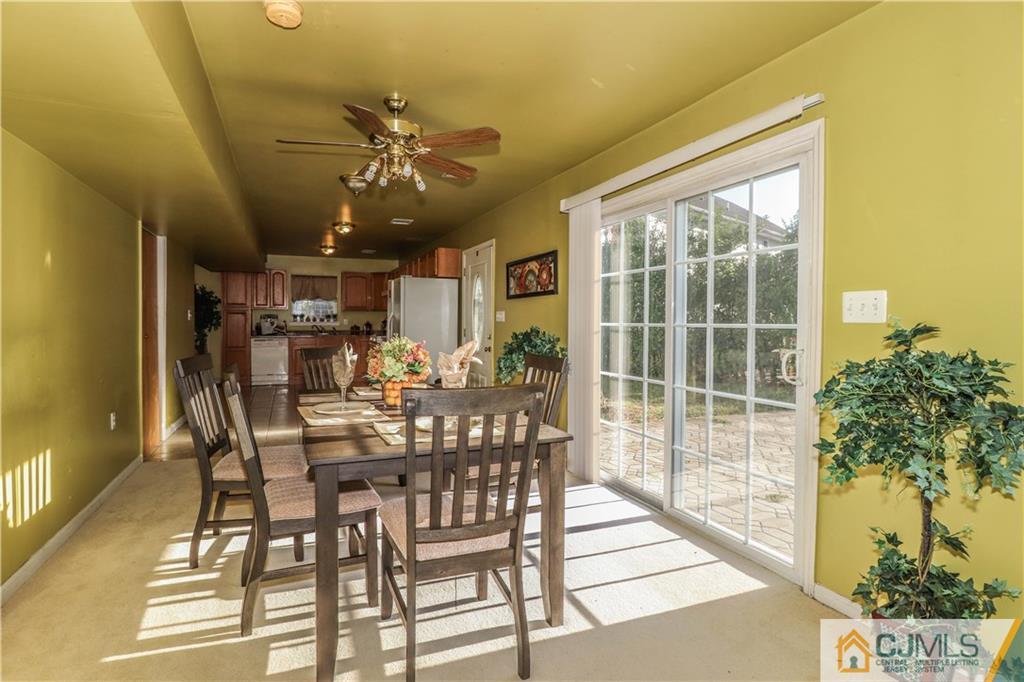 2 Altamont Road Edison, NJ 08817 - Photo 7 of 40 a view of a dining room with furniture and a potted plant