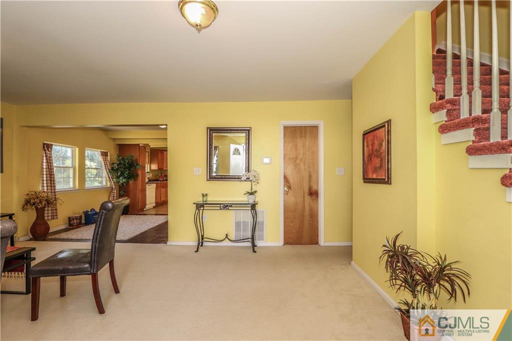 2 Altamont Road Edison, NJ 08817 - Photo 9 of 40 a view of a livingroom with furniture and window