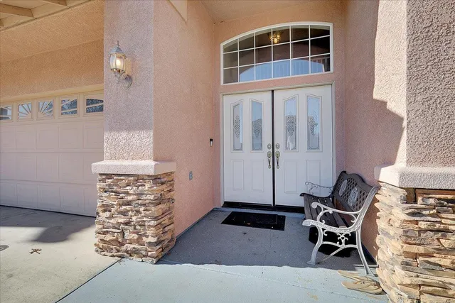 a view of kitchen and hall with wooden floor