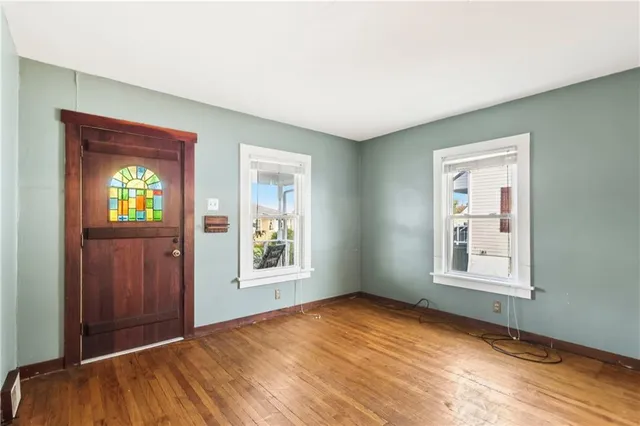 an empty room with windows