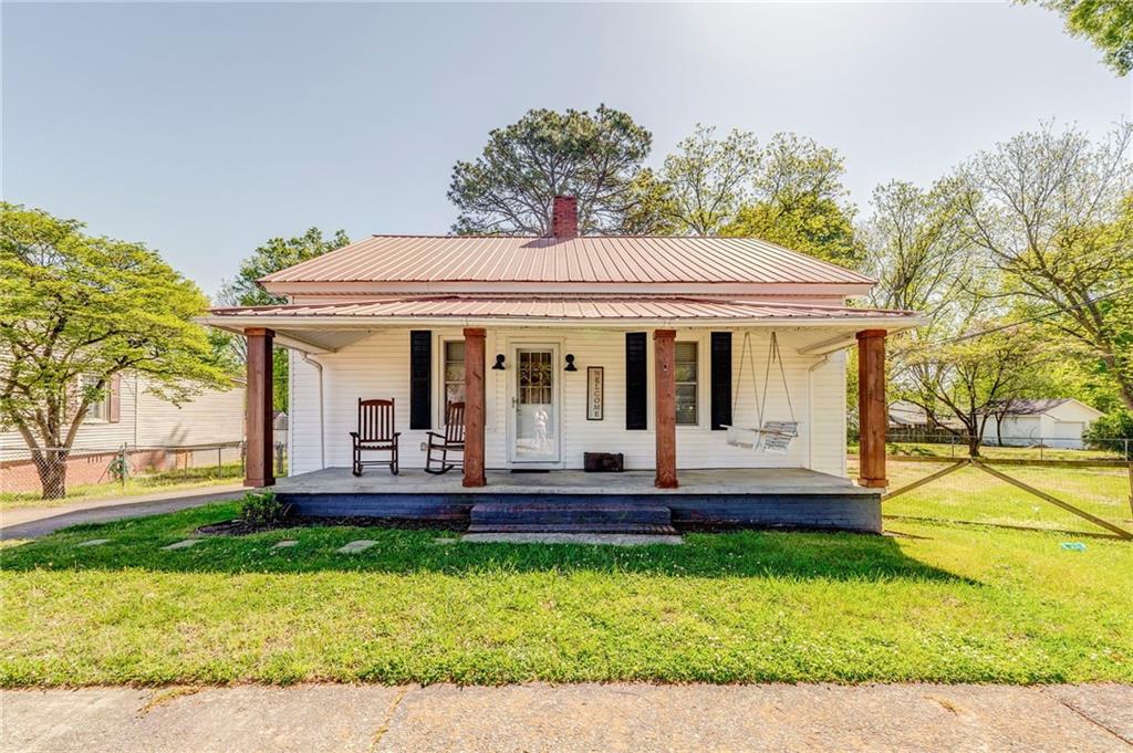 33 Elm Street Aragon, GA 30104 - Photo 1 of 34 front view of a house with a yard