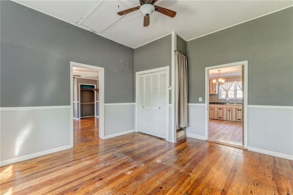 33 Elm Street Aragon, GA 30104 - Photo 21 of 34 wooden floor in an empty room with a window