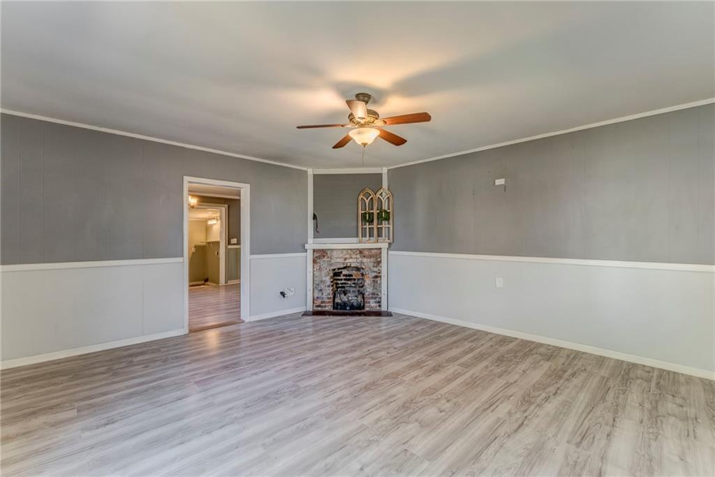 33 Elm Street Aragon, GA 30104 - Photo 6 of 34 wooden floor in an empty room with a window