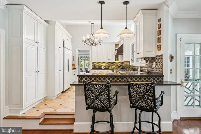a view of living room with furniture and window
