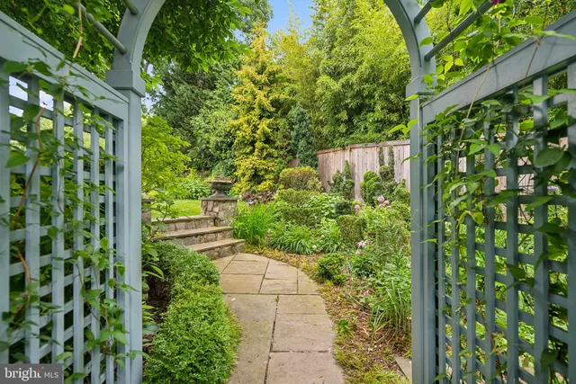 a view of a garden with a fountain