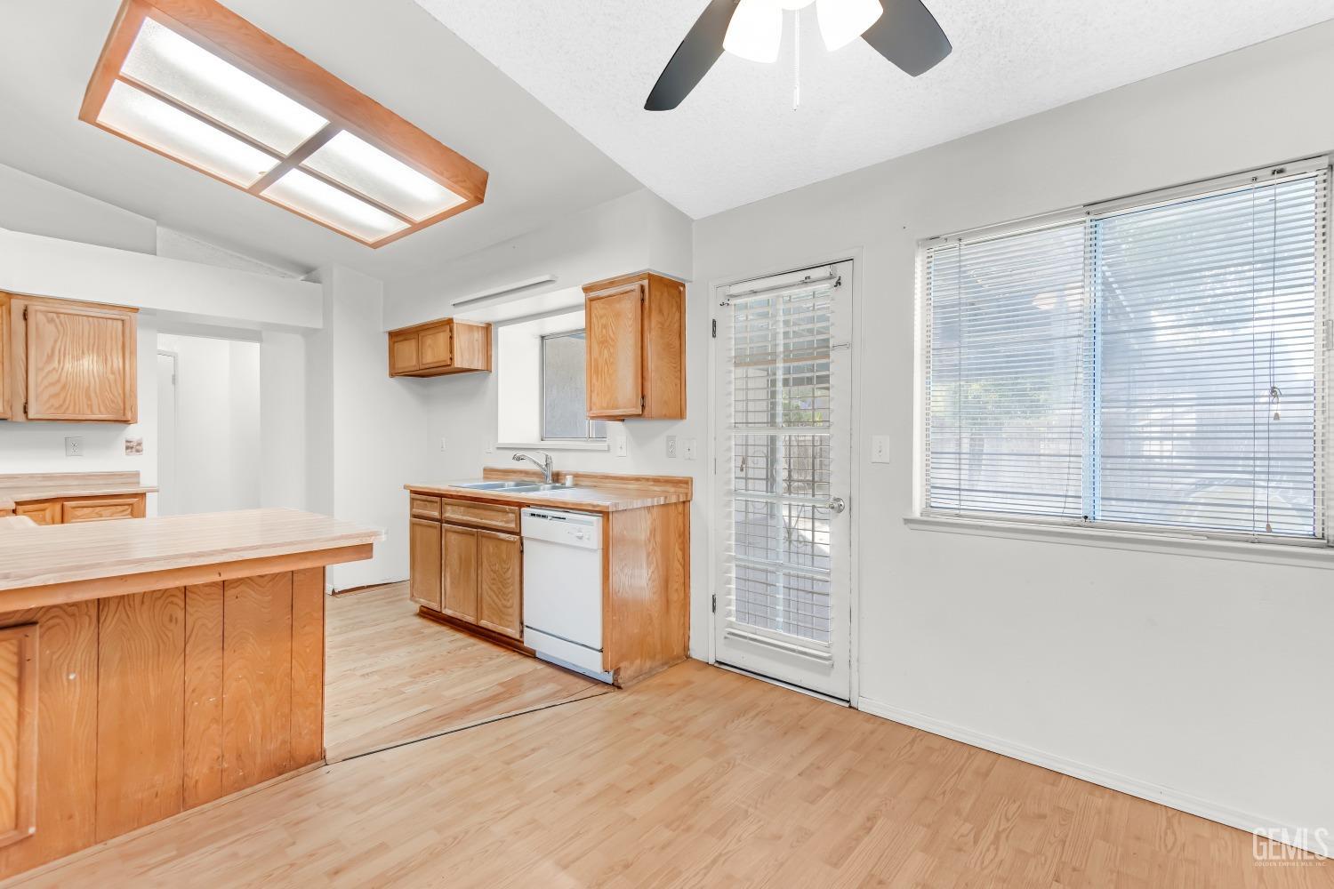 Undisclosed Address Bakersfield, CA 93313 - Photo 11 of 33 a kitchen with stainless steel appliances a stove top oven and a sink