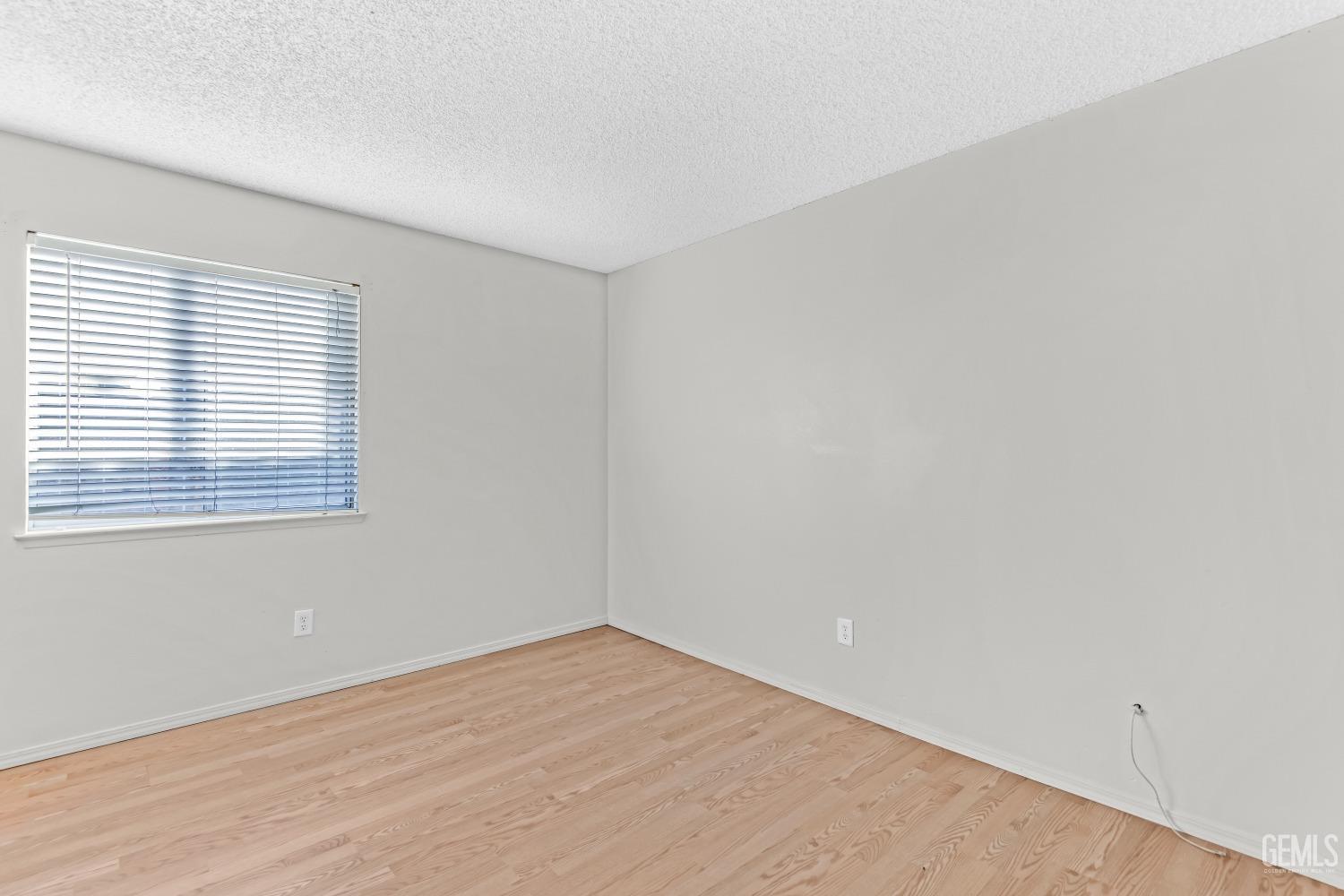 Undisclosed Address Bakersfield, CA 93313 - Photo 20 of 33 an empty room with a window