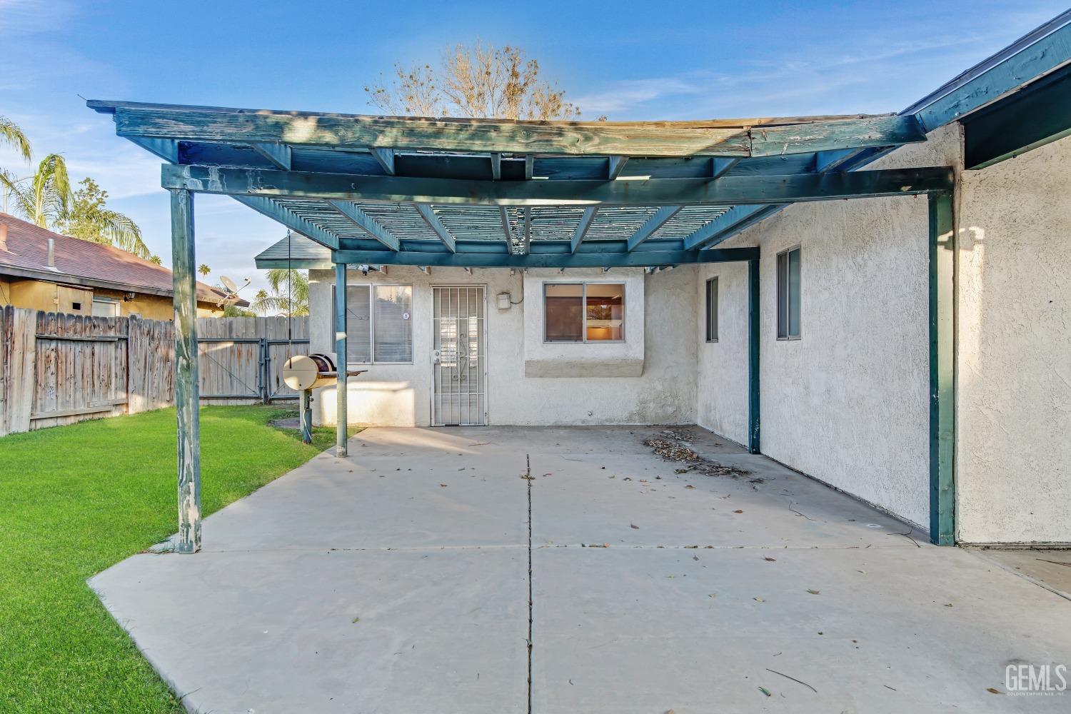 Undisclosed Address Bakersfield, CA 93313 - Photo 32 of 33 a view of a porch with yard