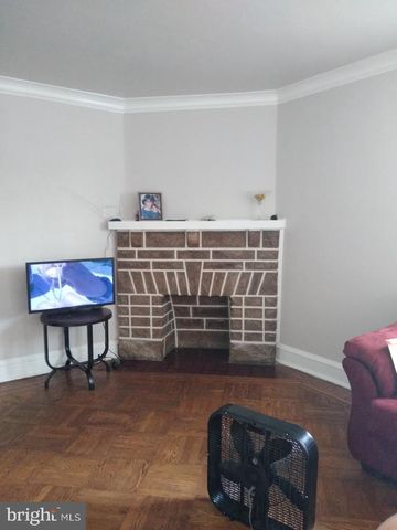 a kitchen with stainless steel appliances a sink stove and cabinets