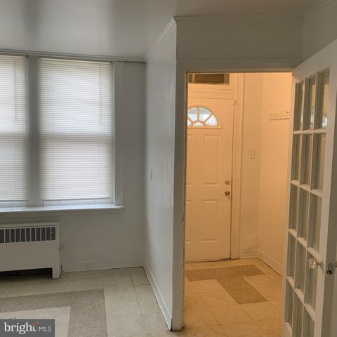 a kitchen with appliances cabinets and a sink