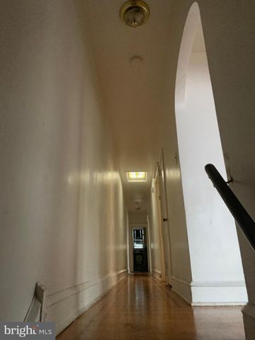 a living room with furniture and window