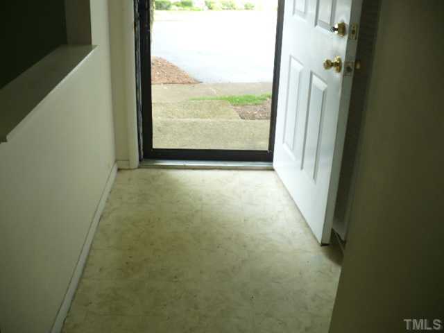 7723 Ohmann Court Raleigh, NC 27615 - Photo 3 of 16 wooden floor in an empty room