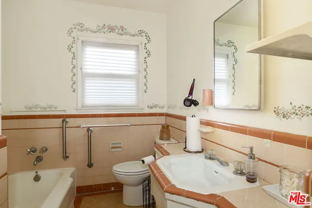 a bathroom with a sink and a bathtub