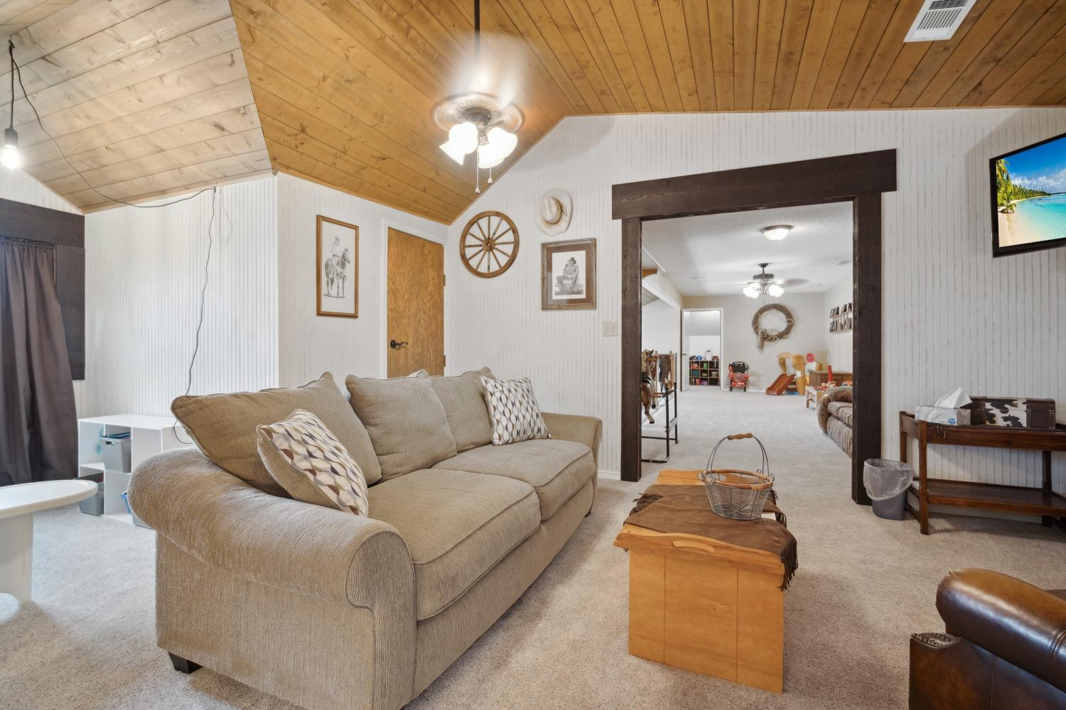 9002 Woodrow Road Wolfforth, TX 79382 - Photo 25 of 48 a living room with furniture and a large window