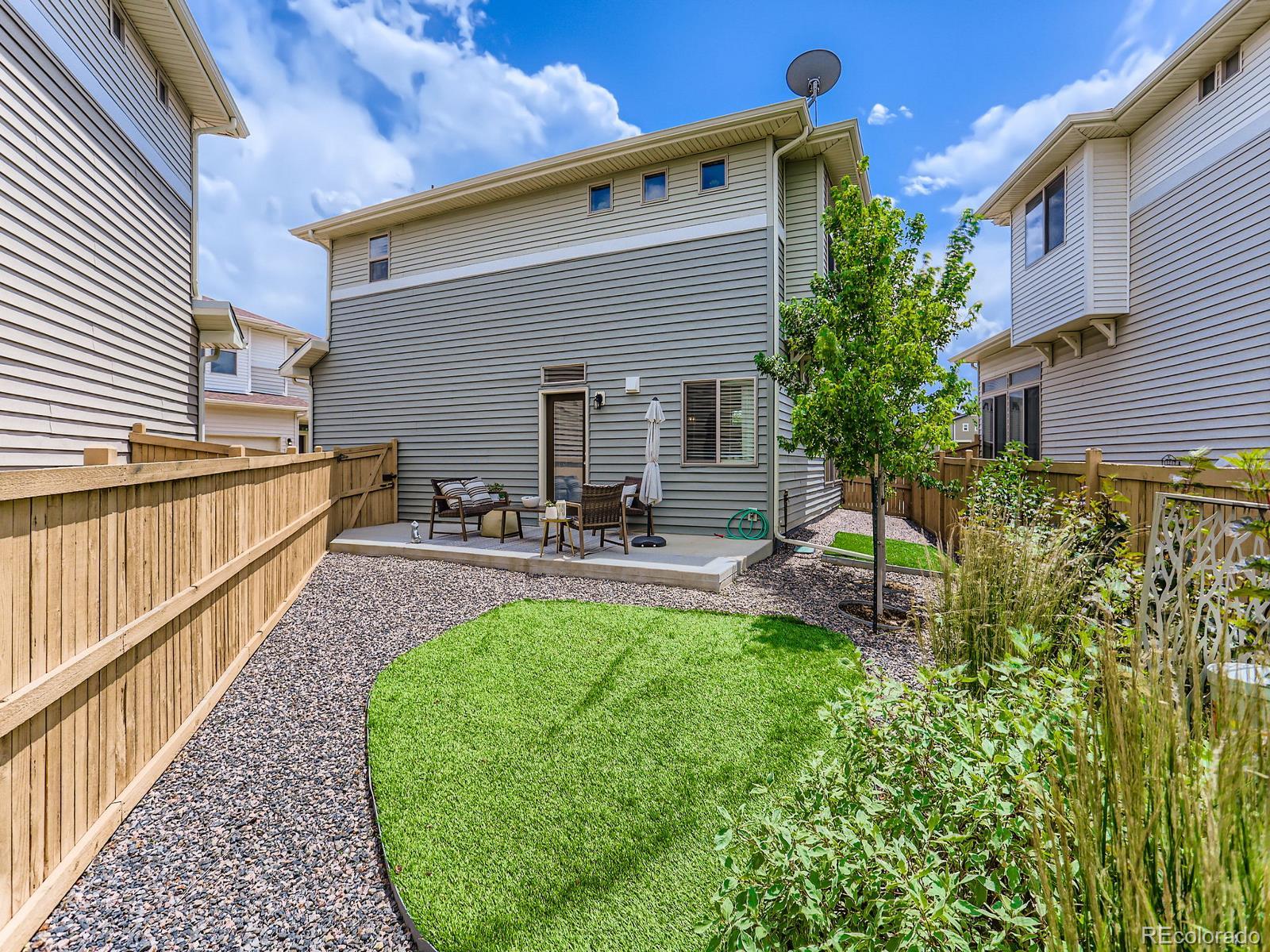 2899 Merry Rest Way Castle Rock, CO 80109 - Photo 27 of 39 a view of a backyard with sitting area