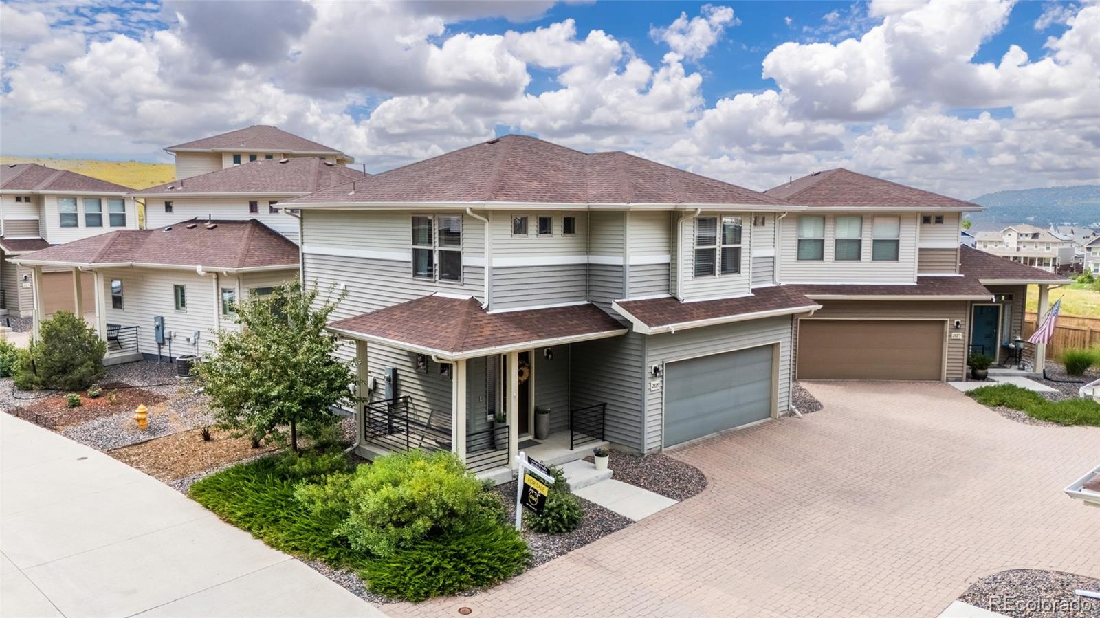 2899 Merry Rest Way Castle Rock, CO 80109 - Photo 31 of 39 a front view of a house with yard and balcony
