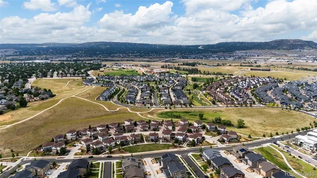 a view of a city with an ocean
