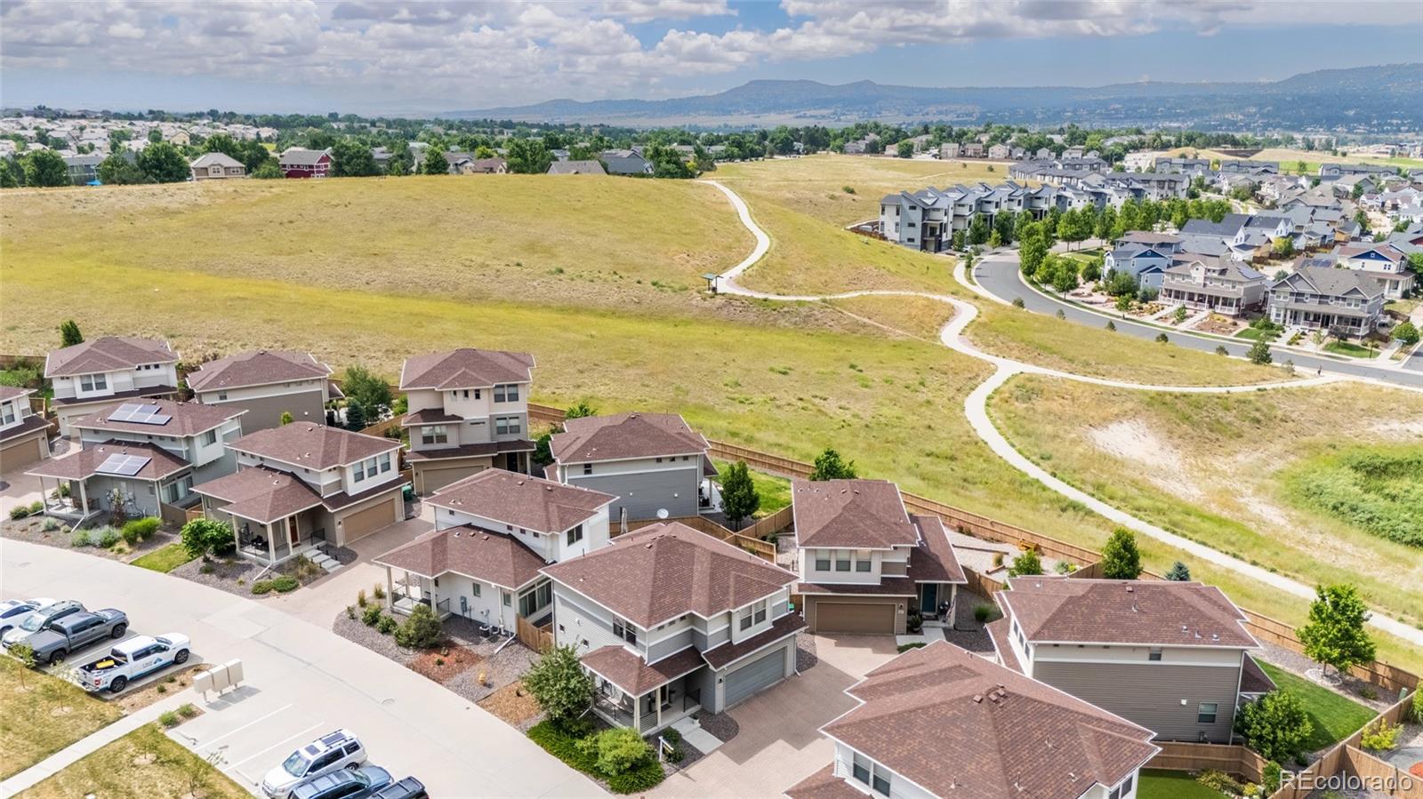 2899 Merry Rest Way Castle Rock, CO 80109 - Photo 36 of 39 an aerial view of residential building and lake