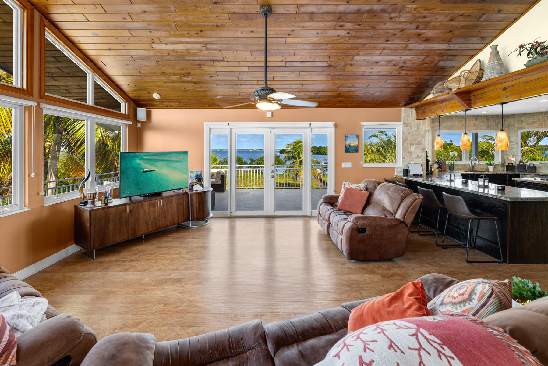 51 Mutiny Place Key Largo, FL 33037 - Photo 18 of 75 a living room with furniture floor to ceiling window and a table